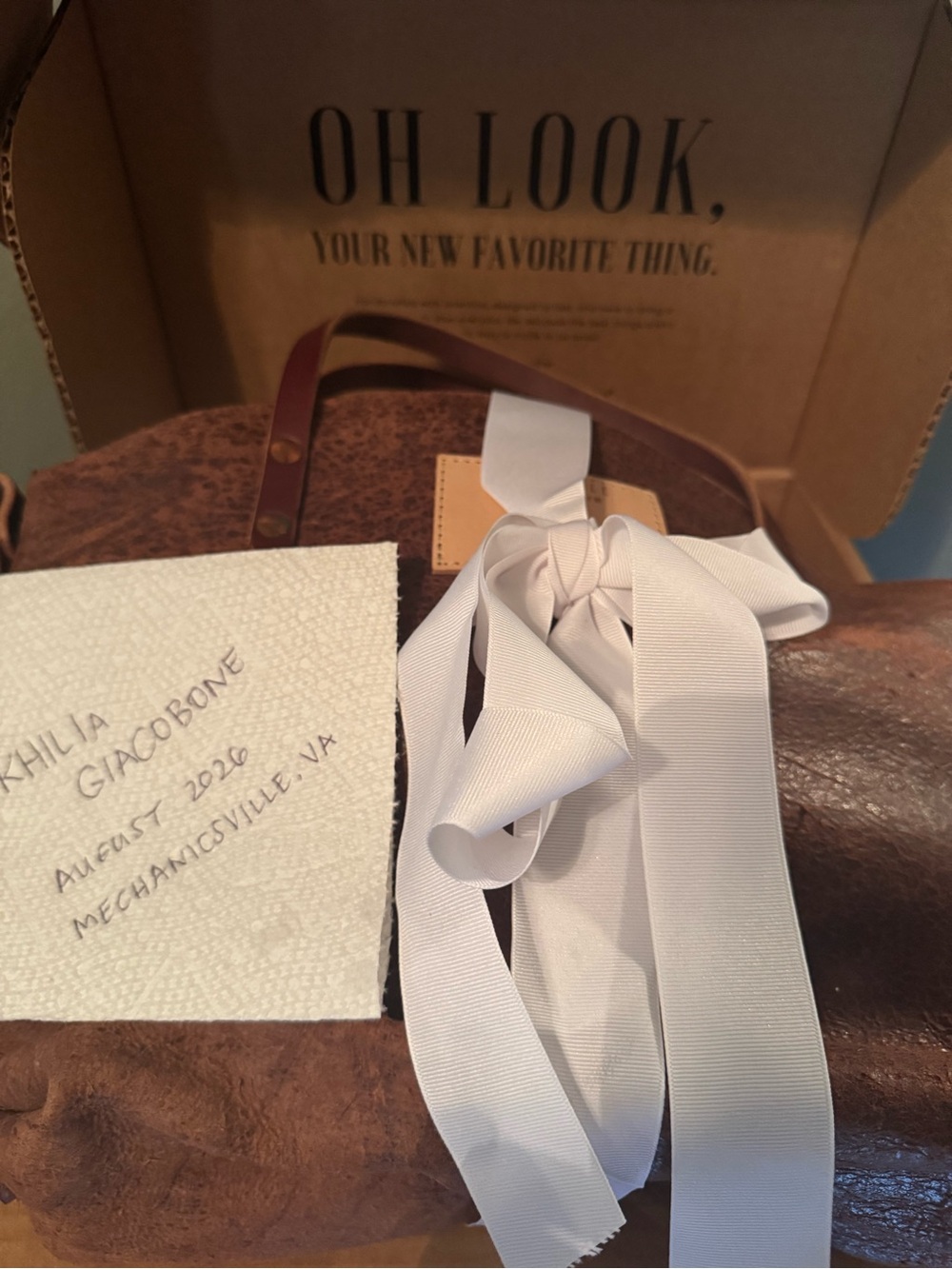 Brown Leather Travel Duffel Bag with White Ribbon Accent